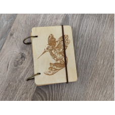 Wooden notebook A7 Hummingbird made of plywood Light on rings