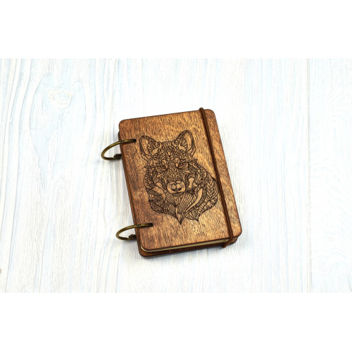 Pocket notebook A7 "Mikhendi Wolf" Dark of plywood on the rings, 60 sheets