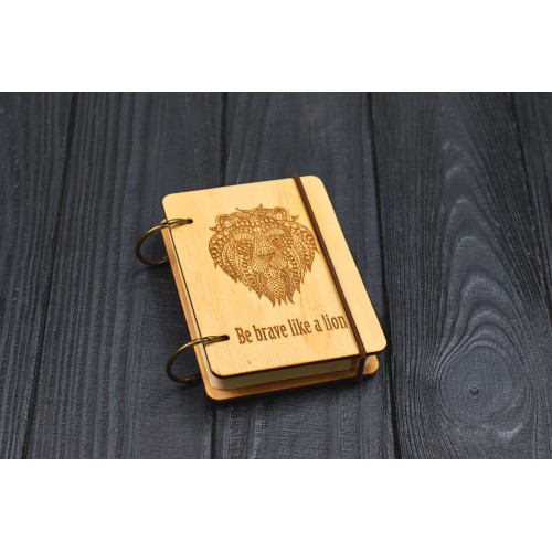 Notebook pocket A7 "Lion" Light of plywood on the rings, 60 sheets