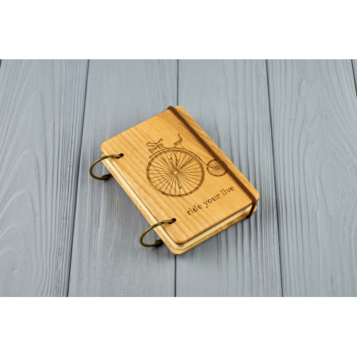 Pocket notebook made of wood A7 on rings "Old bike"