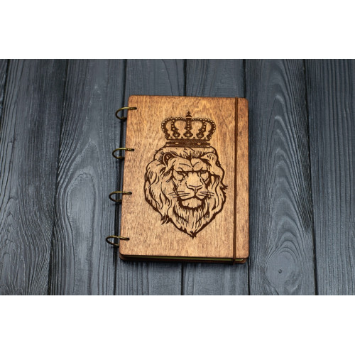 Notebook A5 Lion Dark of plywood on the rings, 60 sheets.