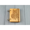 Pocket notebook made of wood A7 on rings "Wolf-mascot" 